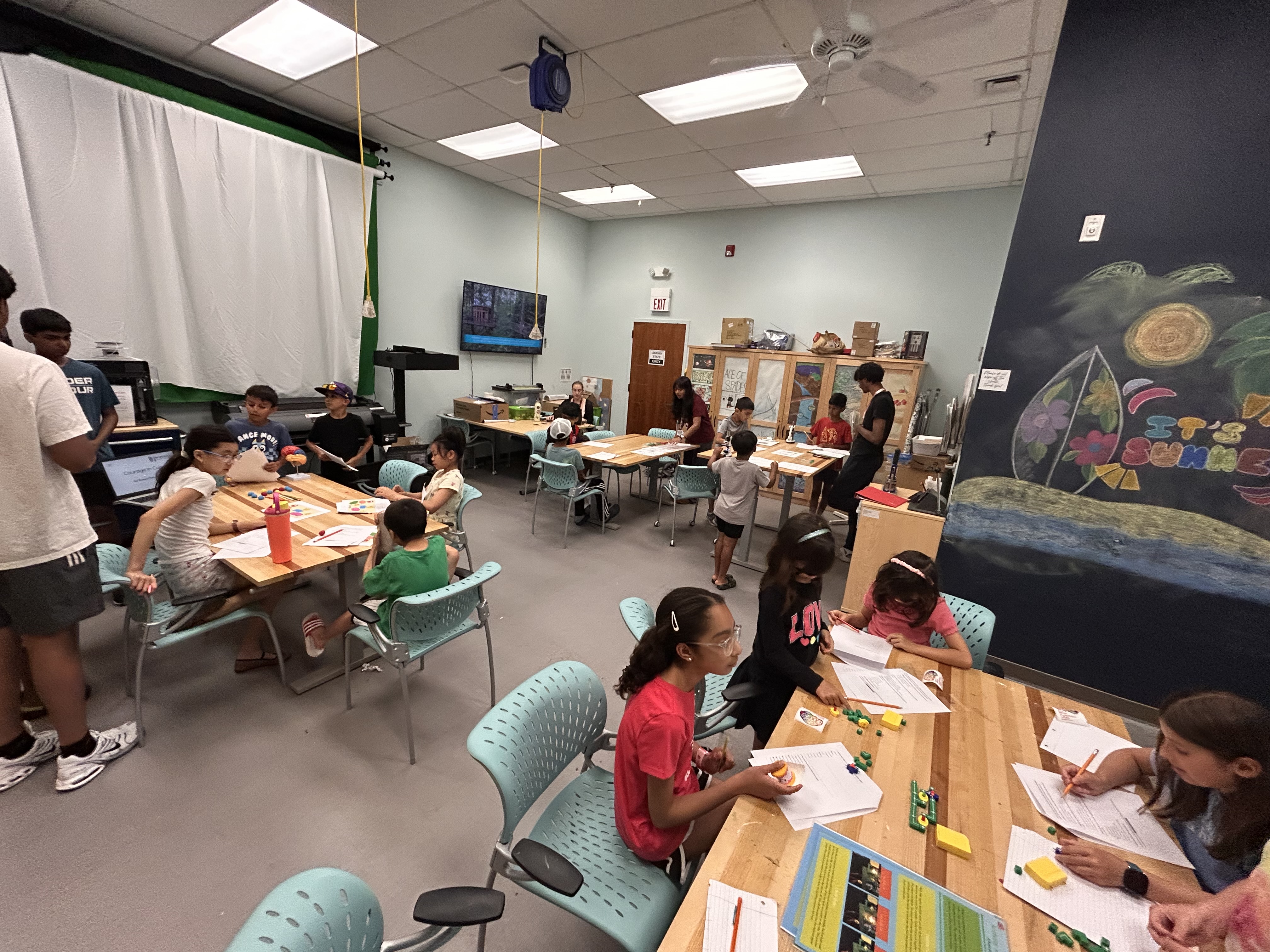 Students working through a hands-on Creation Movement workshop activity